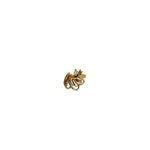 Front view close up of a tiny 18K nose pin gold on a plain white background highlighting its delicate design