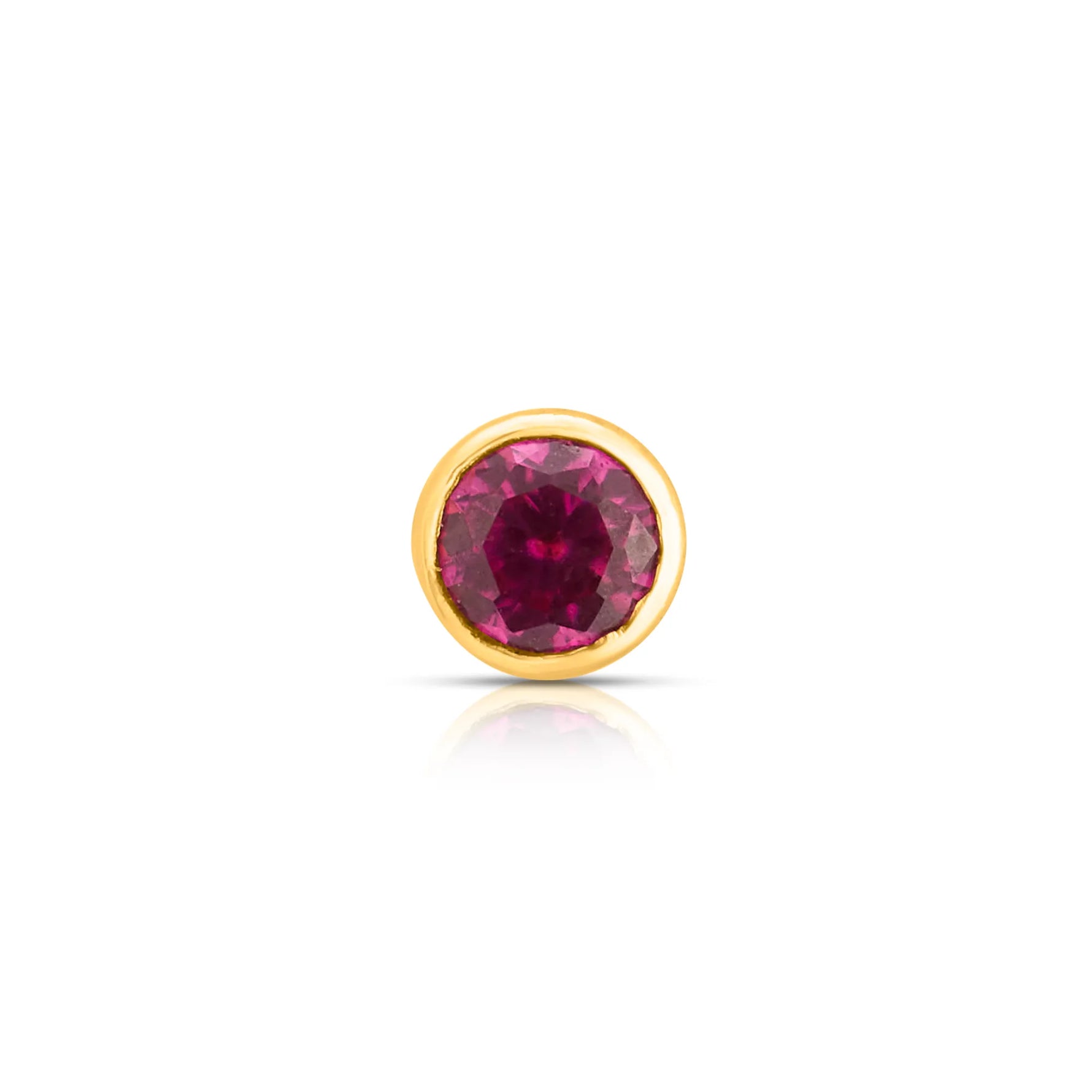 Front view of gold nose pin with round pink gemstone on white background
