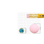 Size comparison image of blue stone gold nose pin on grid